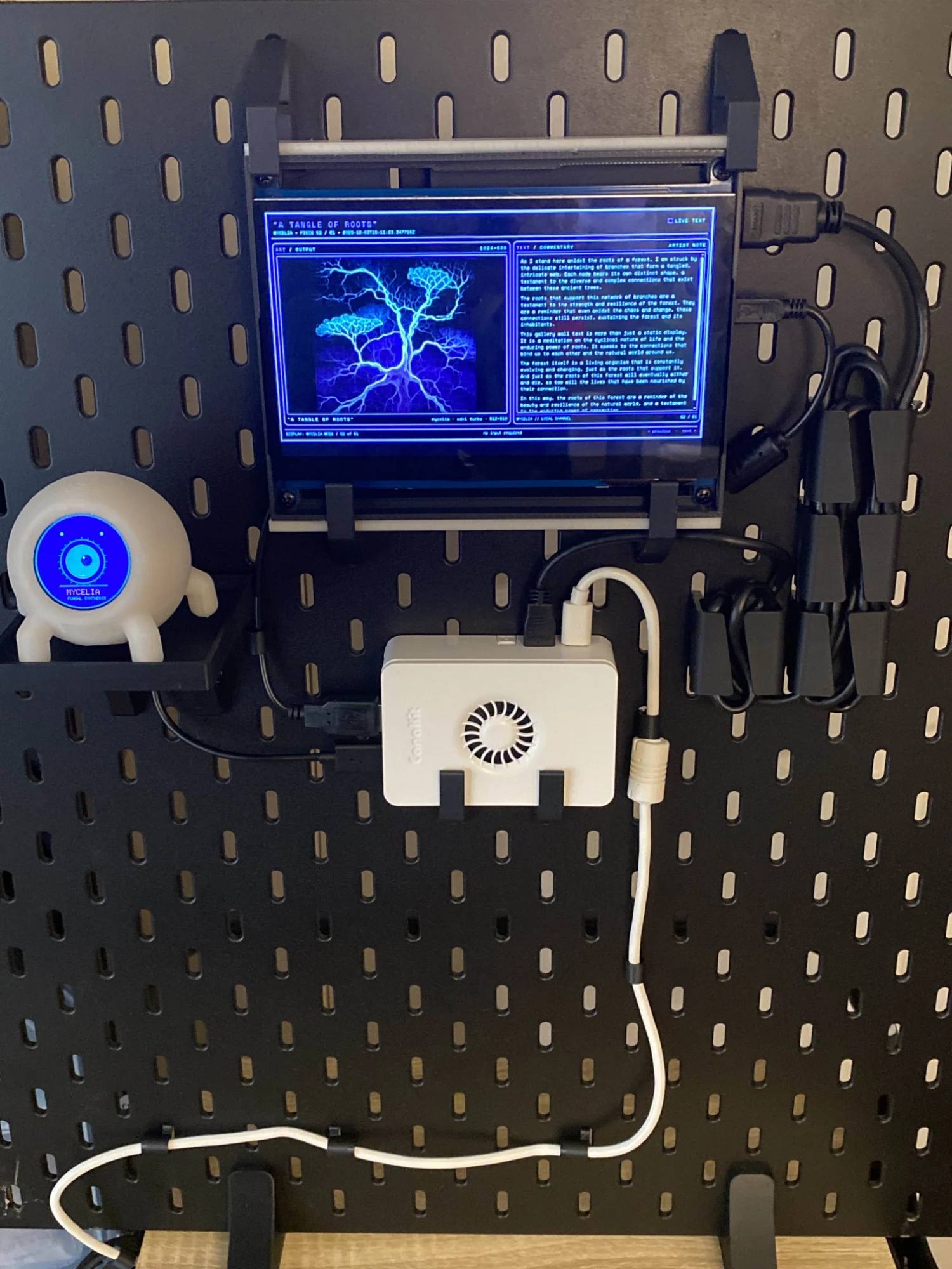 The full museum installation with Raspberry Pi, screen, and ESP32 orb